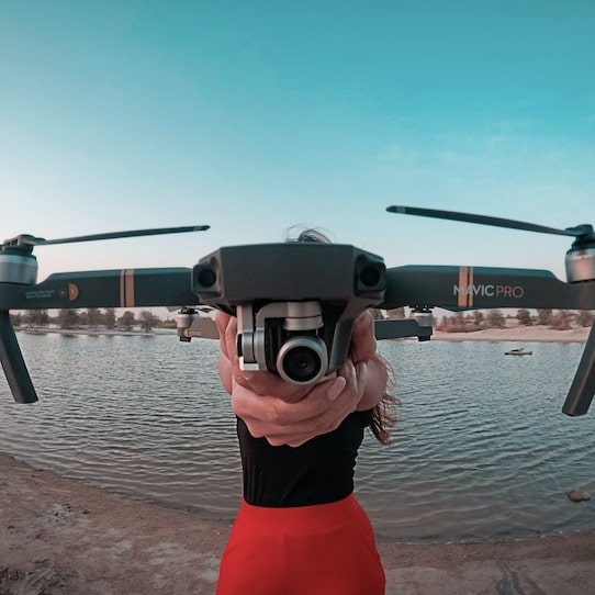 Girl Holding Drone